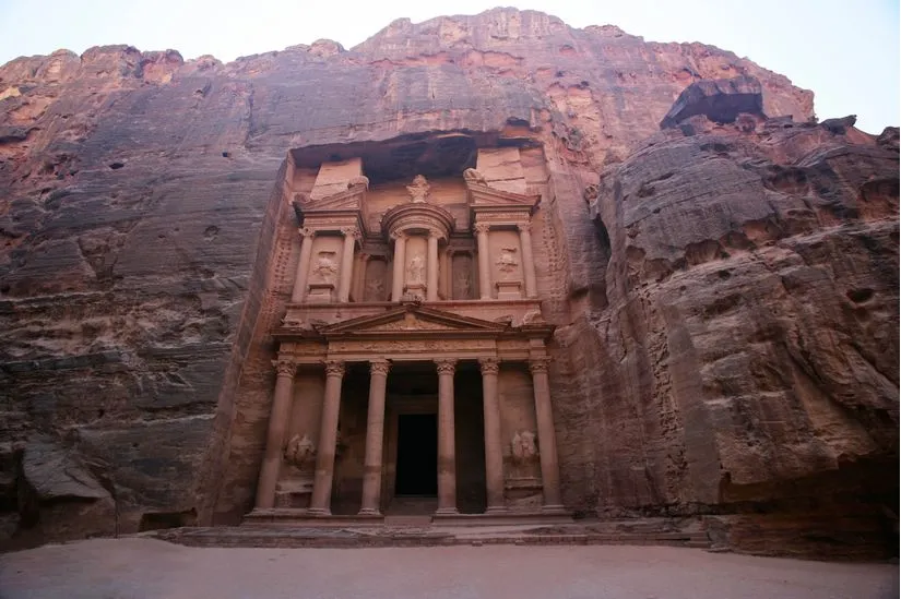 "Beautiful view of Petra, the ancient city in Jordan, showcasing its rock-cut architecture and vibrant desert landscape."